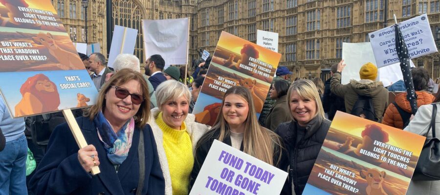 The Caring Hands team at a Social Care Protest in Westminster with placards